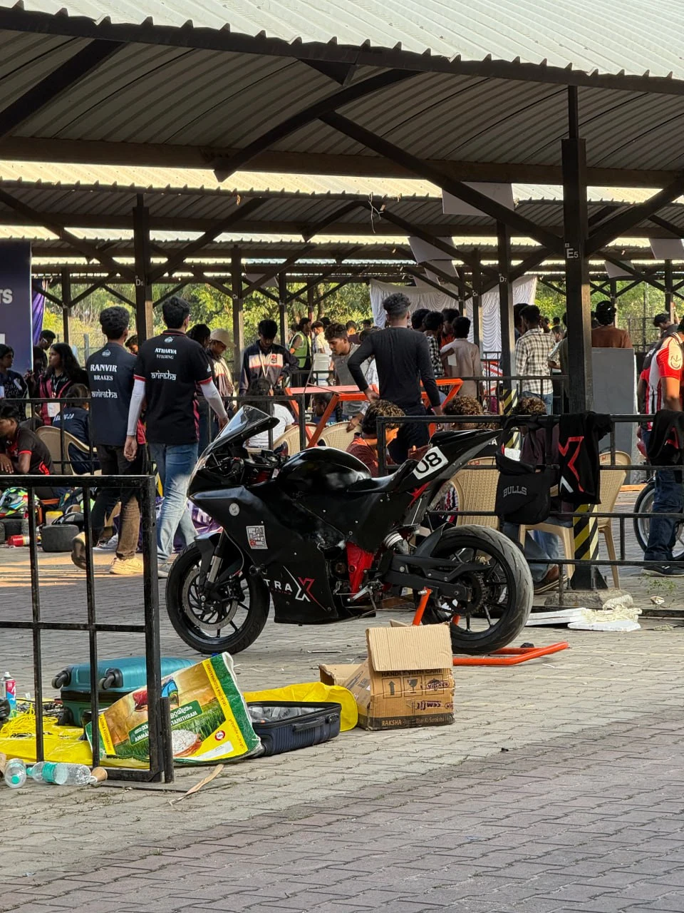 Team TRAX 04 competition motorcycle in paddock